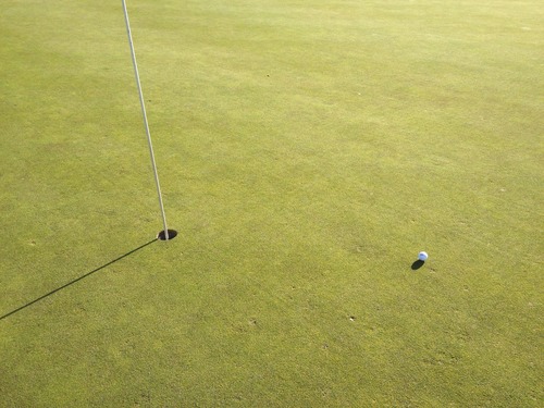 Golf ball and hole Stock Photo 02