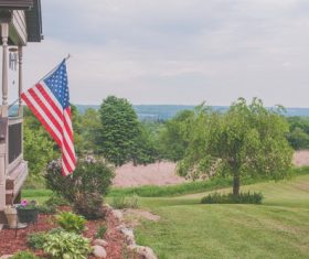 Hanging farmhouse in the American flag Stock Photo