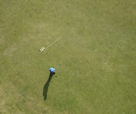 High altitude beat People who play golf Stock Photo