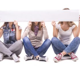 Holding cardboard happy young students Stock Photo 03