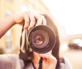 Holding the camera close range Stock Photo