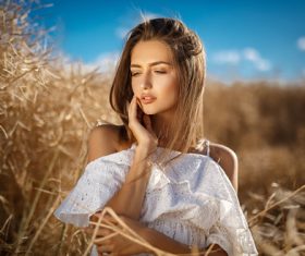 In the wheat field charming and attractive girl Stock Photo 02