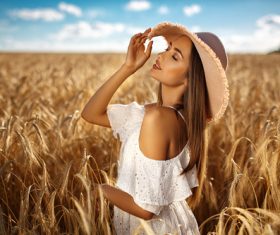 In the wheat field charming and attractive girl Stock Photo 03