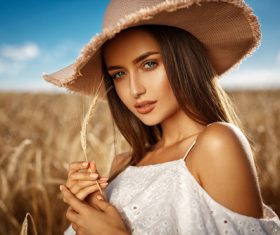 In the wheat field charming and attractive girl Stock Photo 04