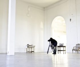 Indoor still life shot of female photographer Stock Photo