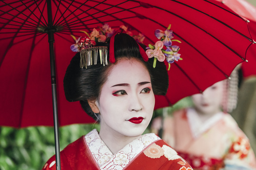 Japanese artisan holding an umbrella Stock Photo