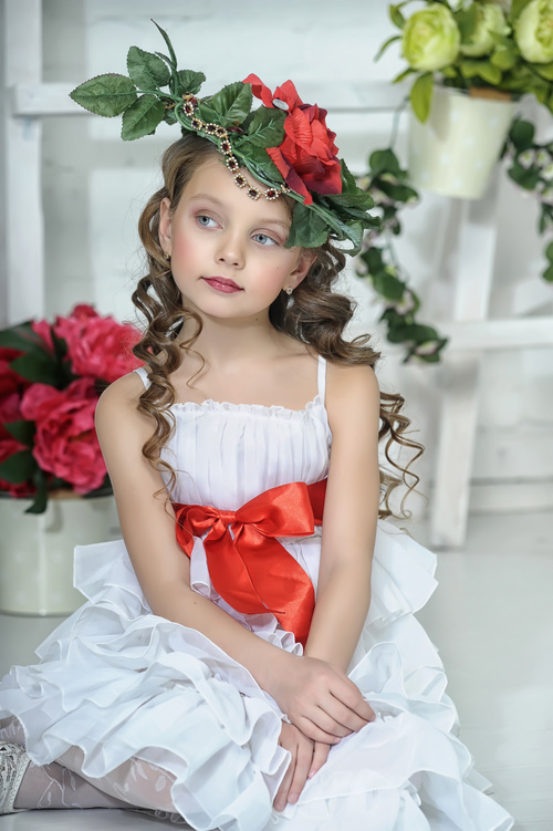 Little girl wearing wreath posing Stock Photo 01