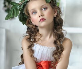 Little girl wearing wreath posing Stock Photo 02