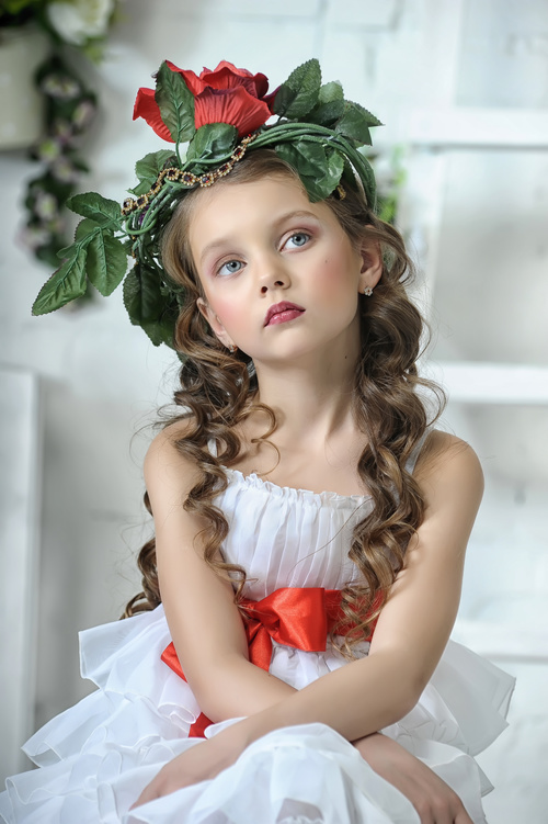 Little girl wearing wreath posing Stock Photo 02