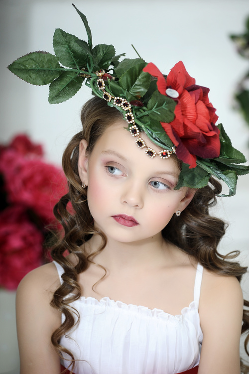 Little girl wearing wreath posing Stock Photo 04