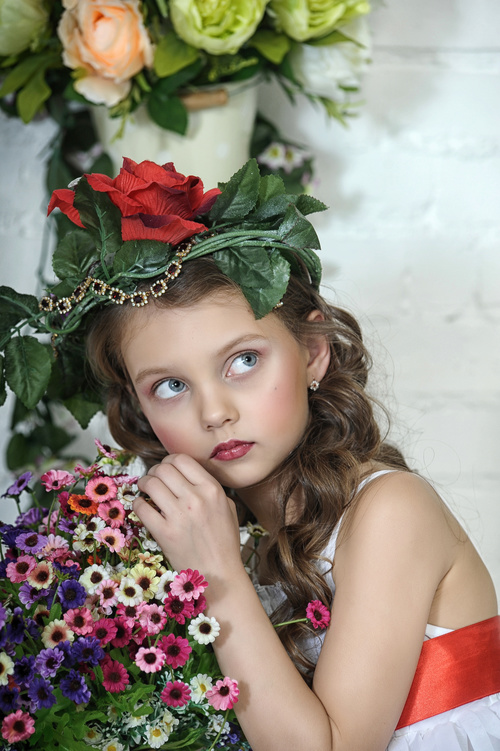 Little girl wearing wreath posing Stock Photo 06