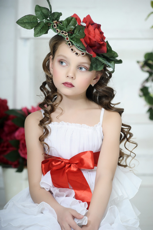 Little girl wearing wreath posing Stock Photo 07