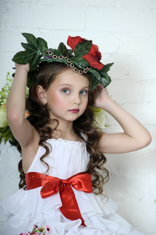 Little girl wearing wreath posing Stock Photo 08