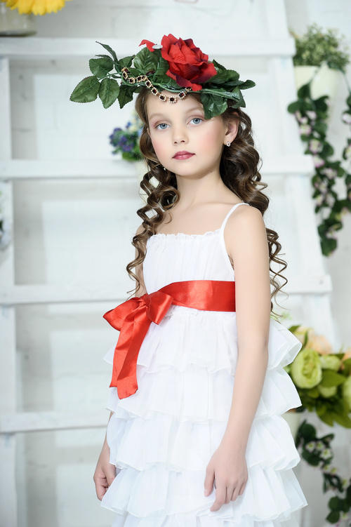Little girl wearing wreath posing Stock Photo 10