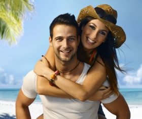 Man carrying girlfriend Stock Photo 01