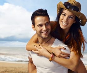 Man carrying girlfriend Stock Photo 03