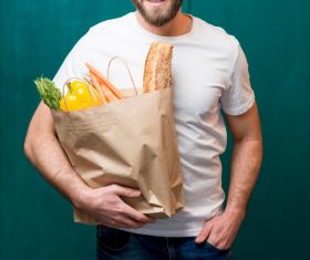 Man holding food bag Stock Photo 01