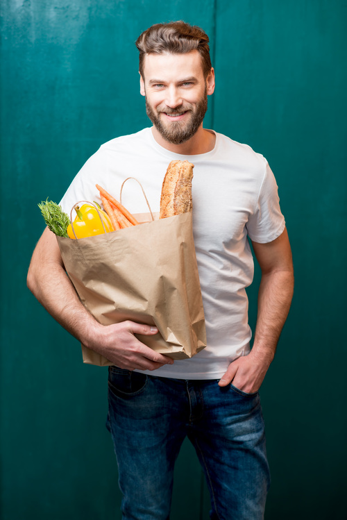 Man holding food bag Stock Photo 01