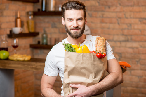 Man holding food bag Stock Photo 03