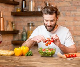 Man making vegetable salad Stock Photo 02