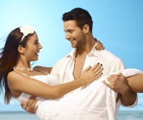 Man picking up girlfriend Stock Photo