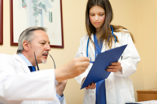 Medical professor and young female student Stock Photo 03