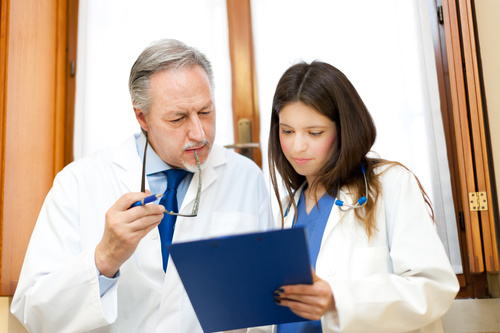 Medical professor and young female student Stock Photo 04