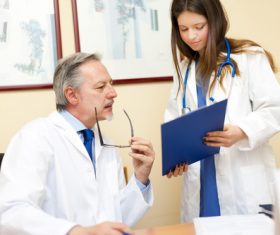 Medical professor and young female student Stock Photo 05