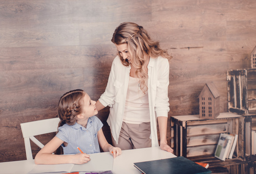 Mother and daughter talk homework Stock Photo