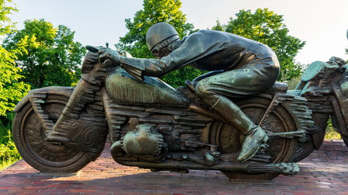 Motorcycle driver bronze statue Stock Photo