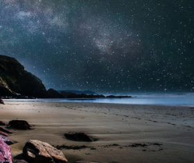 Night starry sky beach scenery Stock Photo