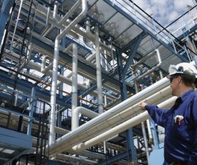 Oil refinery worker Stock Photo