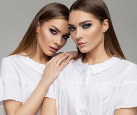 Painted black eyeshadows Beautiful fashion sisters Stock Photo 02