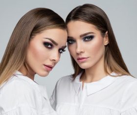 Painted black eyeshadows Beautiful fashion sisters Stock Photo 05