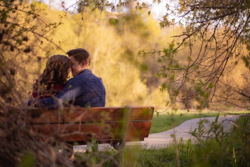 Park bench lovers dating Stock Photo