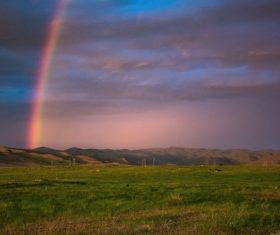 Rainbow after rain in the suburbs Stock Photo