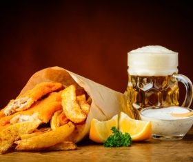 Schnitzel and potato chips and beer Stock Photo