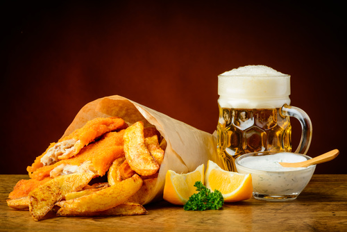 Schnitzel and potato chips and beer Stock Photo