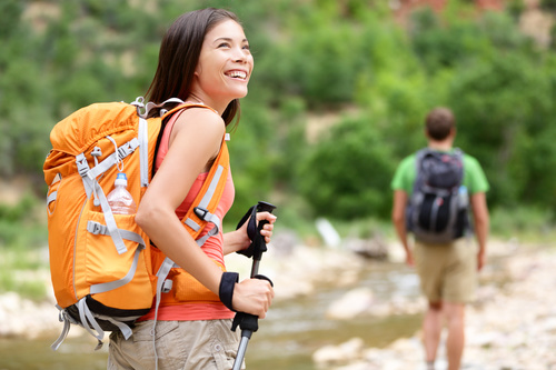 Smiling female hiker mountaineer Stock Photo