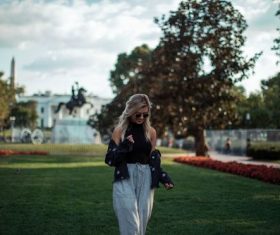 Smiling woman in the park Stock Photo