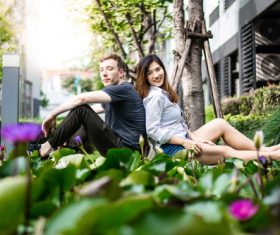 Stock Photo Back to back couple photo