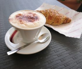Stock Photo Cappuccino and croissant