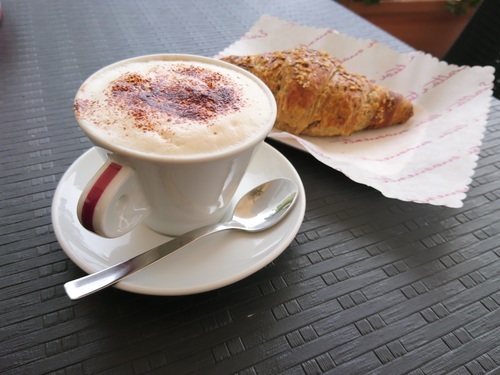 Stock Photo Cappuccino and croissant