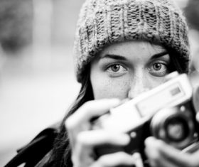 Stock Photo Female photographer black and white photo