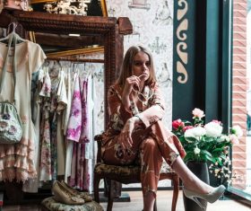 Stock Photo Girl buying new shoes