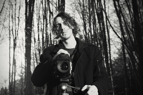 Stock Photo Male photographer in the woods