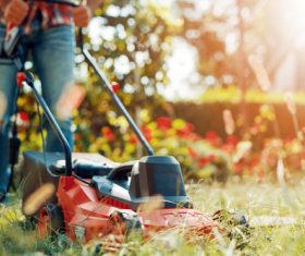 Stock Photo Man mowing the lawn 03