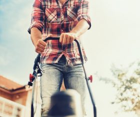Stock Photo Man mowing the lawn 04