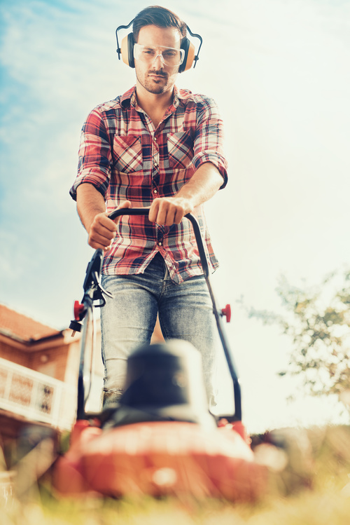 Stock Photo Man mowing the lawn 04