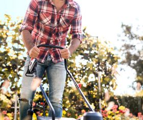 Stock Photo Man mowing the lawn 05